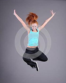 Woman jumping and dancing