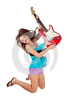 Woman jumping with an electric guitar
