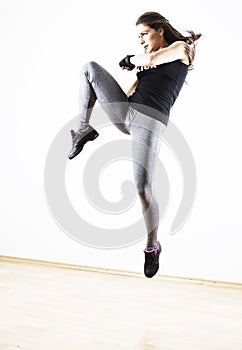 Woman jumping high photo