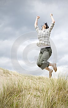 Woman jumping for joy