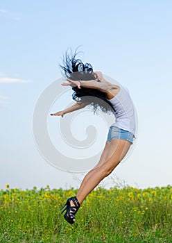 Woman jumping for joy