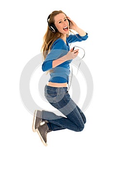 Woman jumping with MP3 player photo