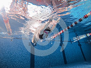 woman jumping at public pool sport activities