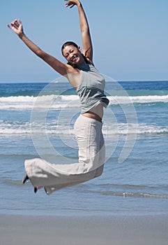 Woman Jumps in Air with Joy