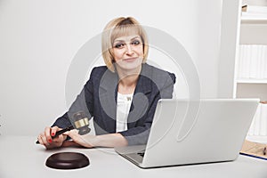 Woman jurist working computer in office isolated.