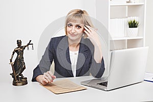 Woman jurist working laptop in office isolated.