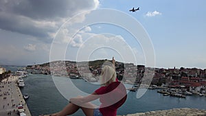 Woman on Kamerlengo castle of Trogir