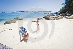woman with a kayak on an  beach in Andaman sea, Koh Adang - solo travel