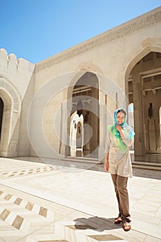 Woman with kerchief on head in arab country photo