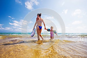 Summer family vacations background. Mother with daughter in the