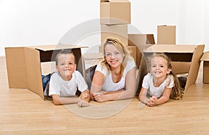 Woman with kids moving into a new home