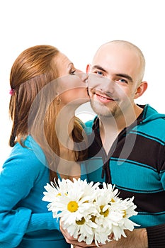 Woman kiss bold young happy man