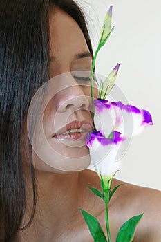 Woman kisses flowers