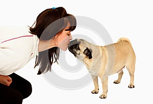 Woman kissing a dog mops