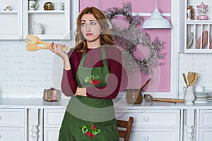 Woman at kitchen, with interesting mood, prepare food