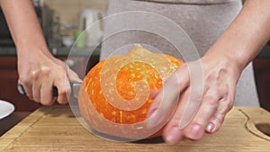 Woman in the kitchen making a pumpkin pie. 4k, slow-motion shooting. dolly shot