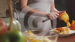 Woman in the kitchen making a pumpkin pie. 4k, slow-motion shooting. dolly shot