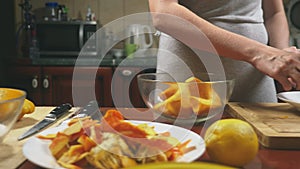 Woman in the kitchen making a pumpkin pie. 4k, slow-motion shooting. dolly shot