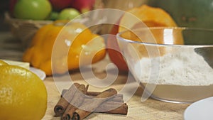 Woman in the kitchen making a pumpkin pie. 4k, slow-motion shooting. dolly shot