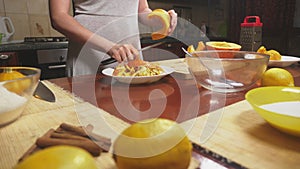 Woman in the kitchen making a pumpkin pie. 4k, slow-motion shooting. dolly shot