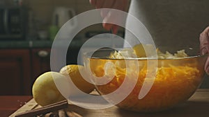 Woman in the kitchen making a pumpkin pie. 4k, slow-motion shooting. dolly shot