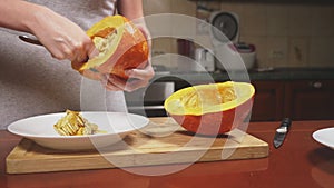 Woman in the kitchen making a pumpkin pie. 4k, slow-motion shooting. dolly shot