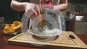 Woman in the kitchen making a pumpkin pie. 4k, slow-motion shooting. dolly shot