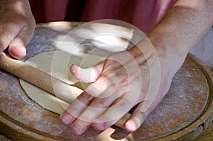 Woman knead the dough for cooking