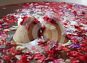 woman knees in Rose Petals Bath