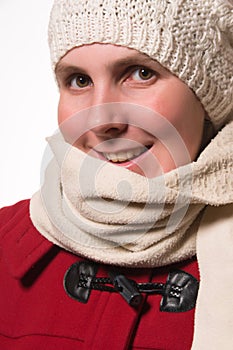 Woman with knit hat and red winter coat