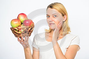 Woman knows how stay in shape and be healthy. Major portion of your meals will comprise of apple. Girl hold basket with