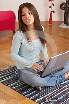 Woman with laptop photo