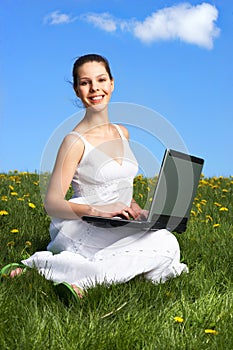 Woman, laptop and blue sky