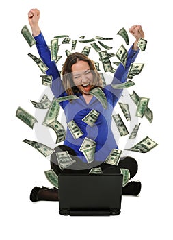 woman of the laptop with fly out dollars