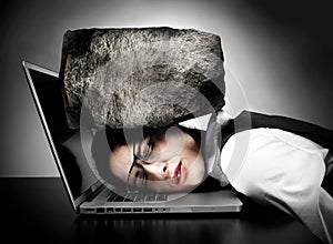 Woman with laptop having stress.