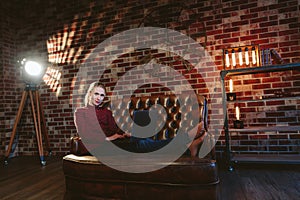 Woman with laptop in loft