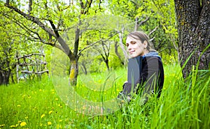 Woman with laptop outdoors