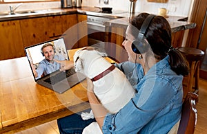 Woman with laptop in virtual meeting video conference Working from home due coronavirus lockdown