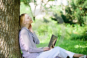 Woman with laptop work outdoors lean tree. Minute for relax. Education technology and internet concept. Girl work with