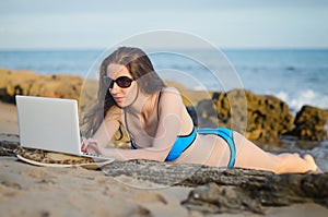 Woman with laptop working