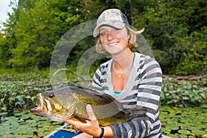 Woman Large Mouth Bass Fishing