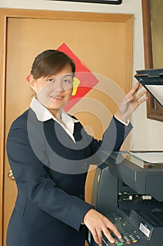 Woman and laser copier