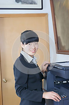 Woman and laser copier