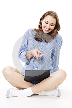 Woman laugh and point at laptop with finger