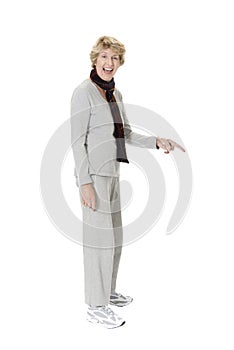 Woman laughing and pointing on white