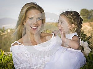 Woman Laughs with her Daughter