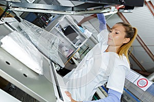 Woman laundry worker at dry cleaners