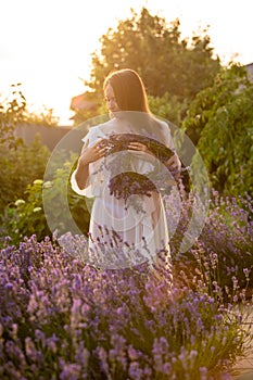 Woman with lavender wreath and whitre dress