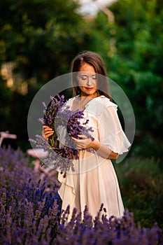Woman with lavender wreath and whitre dress