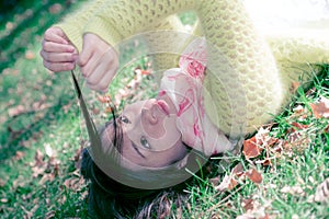 Woman laying in grass